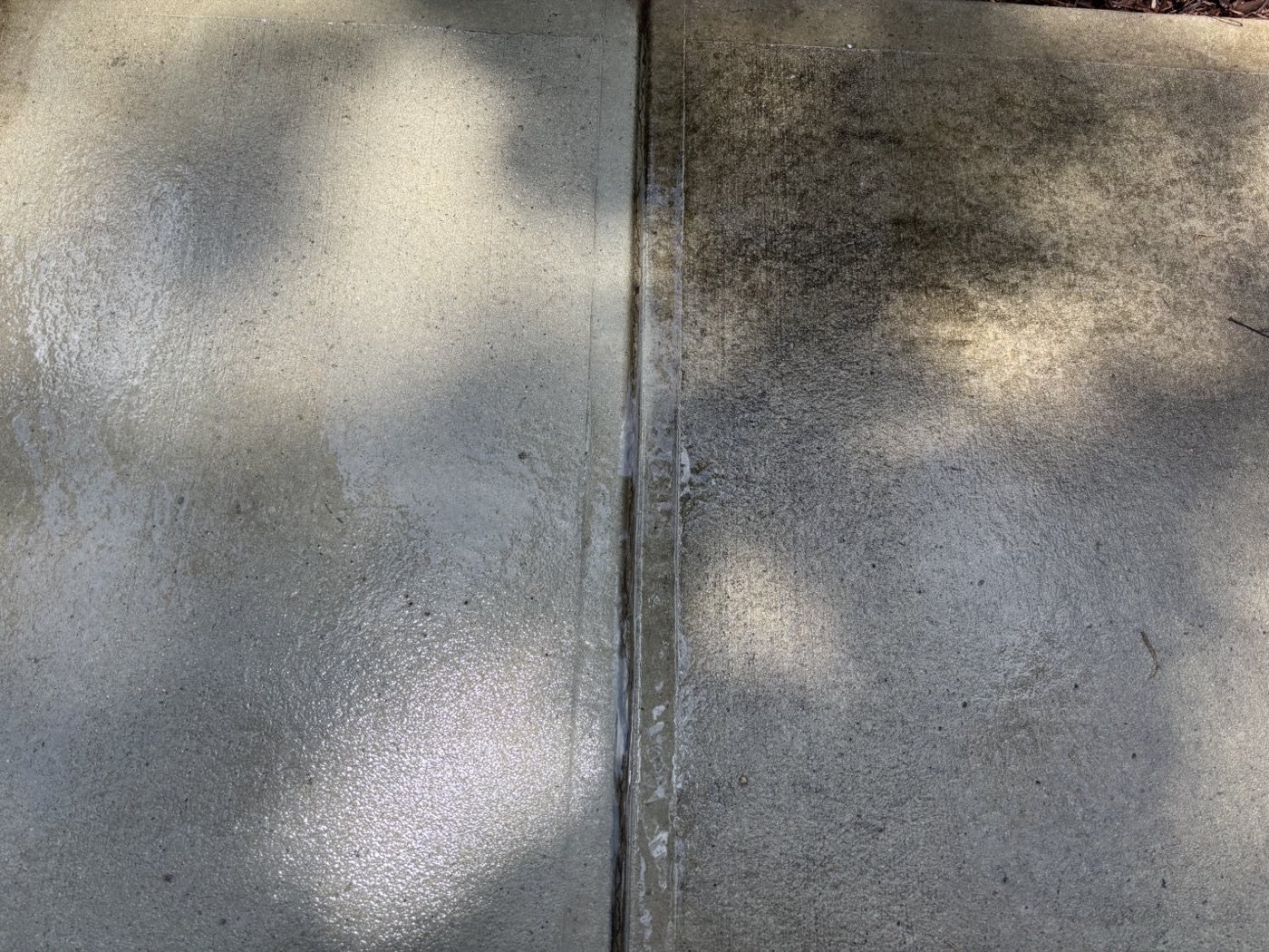 Driveway concrete — dirty versus freshly power-washed